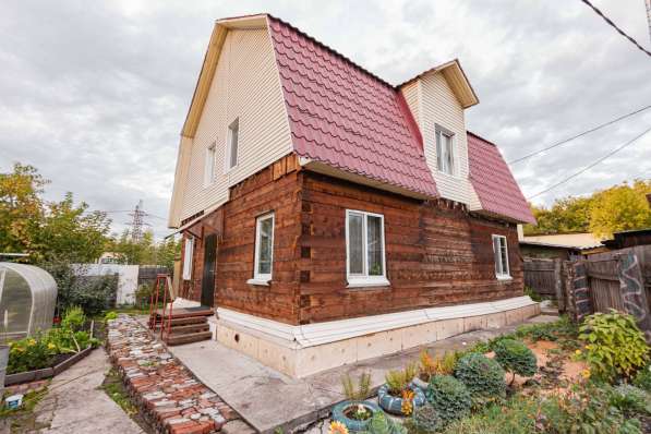 Продается двухэтажный коттедж из бруса в центре города в Томске