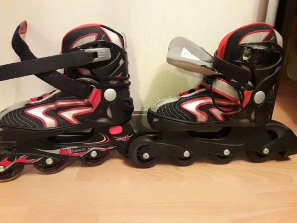 Коньки роликовые
