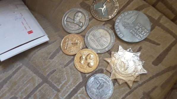 Продам жетоны и монеты в фото 3